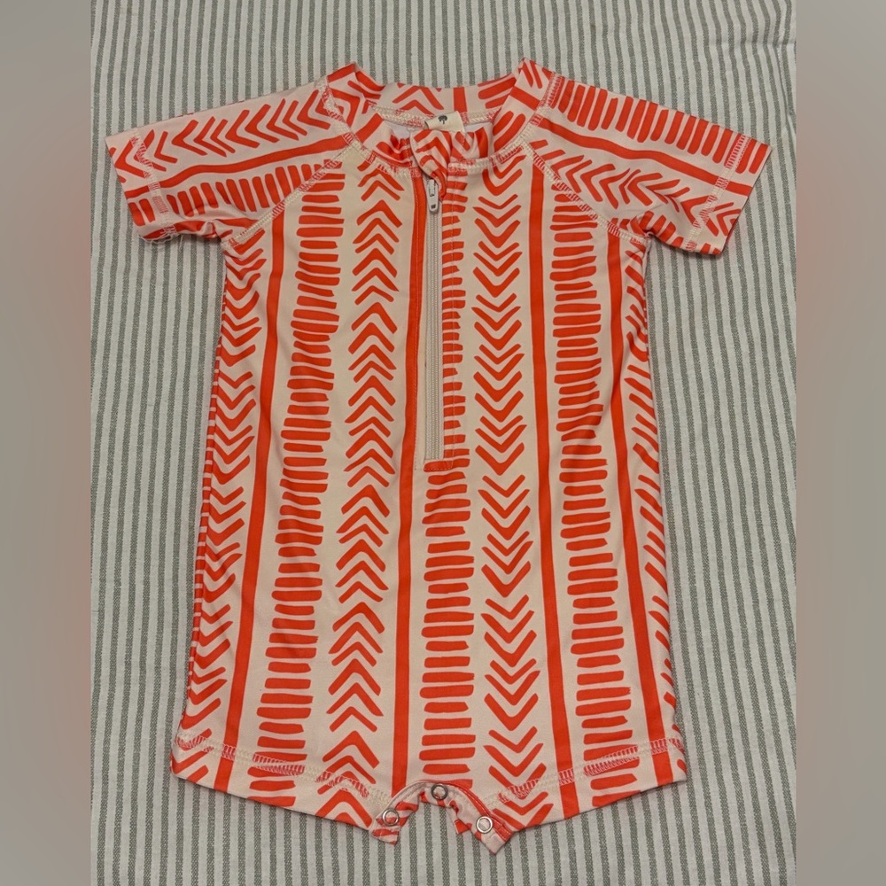 Kate Quinn rash guard swim suit